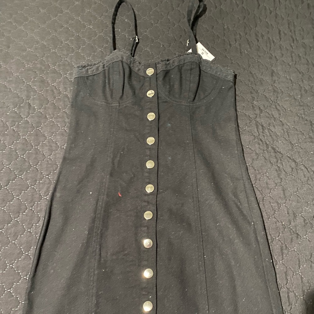 Black denim button dress.